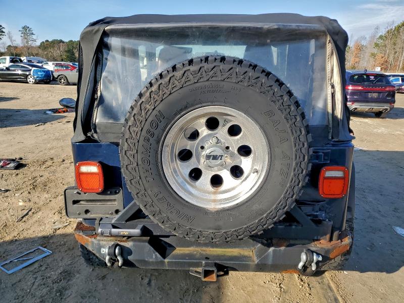 Photo 6 from auction – 2004 JEEP WRANGLER / TJ with VIN 1J4FA29194P702081