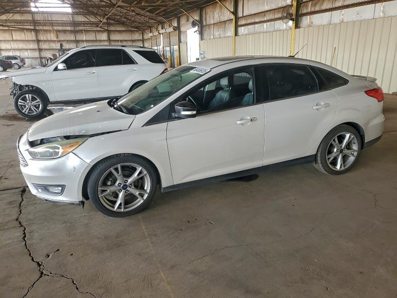 FORD FOCUS TITA 2015 with VIN 1FADP3J29FL248873 - Photo from auction
