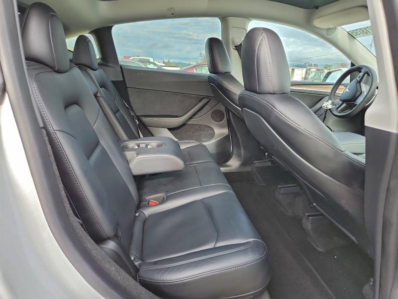 Photo 11 from auction – 2023 TESLA MODEL Y with VIN 7SAYGDEE4PF625140