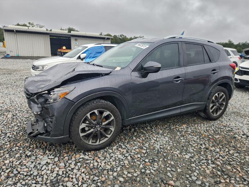 MAZDA CX-5 GT 2016 with VIN JM3KE2DY0G0897859 - Photo from auction