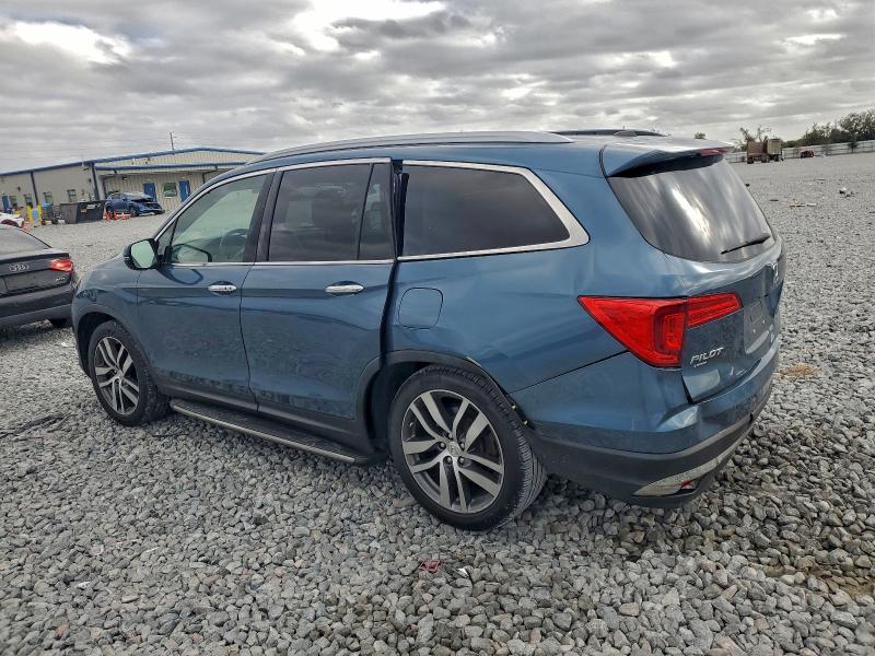 Photo 2 from auction – 2017 HONDA PILOT TOUR with VIN 5FNYF6H91HB028670