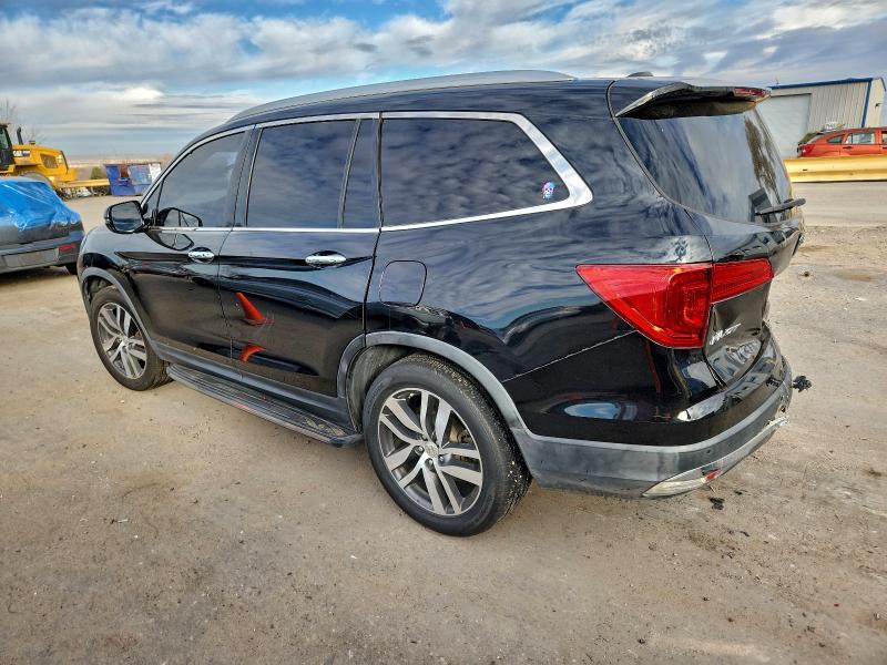 Photo 2 from auction – 2016 HONDA PILOT with VIN 5FNYF5H92GB012762