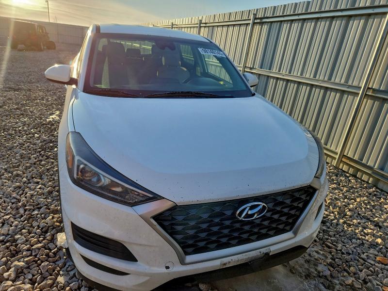 Photo 5 from auction – 2019 HYUNDAI TUCSON SE with VIN KM8J2CA40KU885437