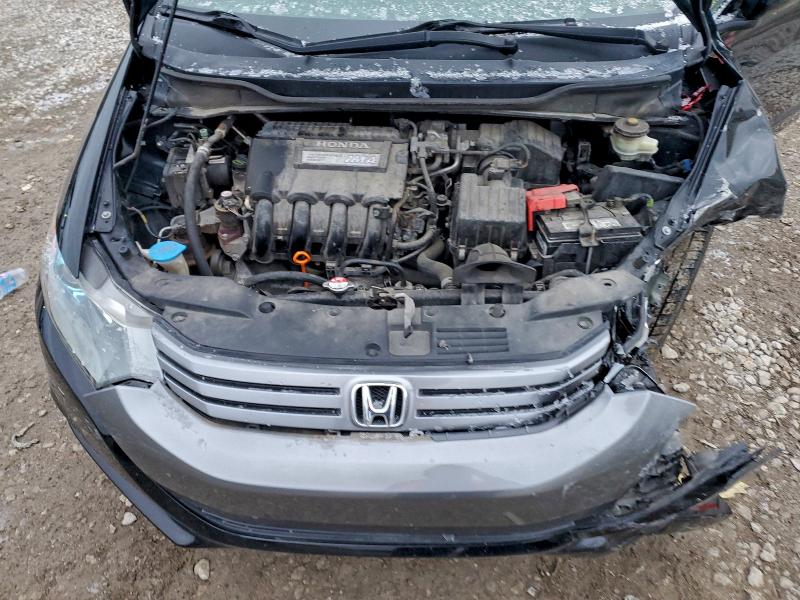 Photo 11 from auction – 2010 HONDA INSIGHT EX with VIN JHMZE2H79AS009614