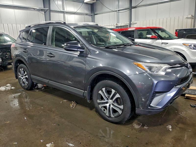 Photo 4 from auction – 2016 TOYOTA RAV4 LE with VIN JTMBFREVXGD197228