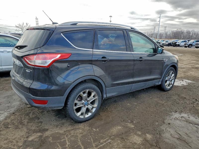 Photo 3 from auction – 2014 FORD ESCAPE TIT with VIN 1FMCU9J95EUD85683