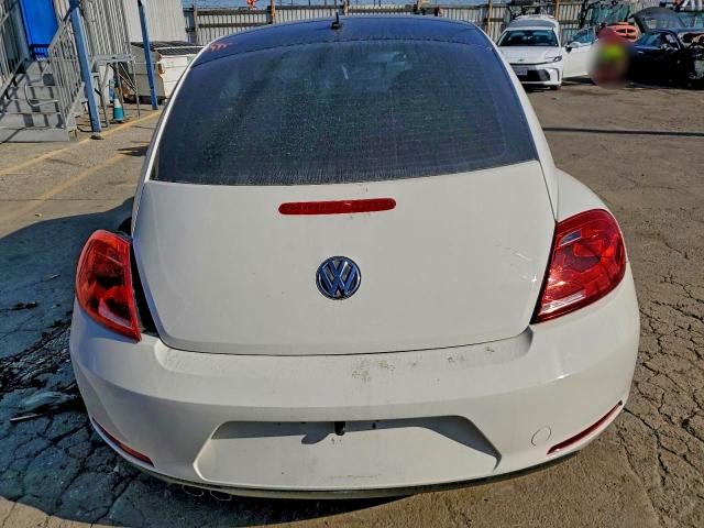 Photo 6 from auction – 2012 VOLKSWAGEN BEETLE with VIN 3VWFP7AT8CM637806