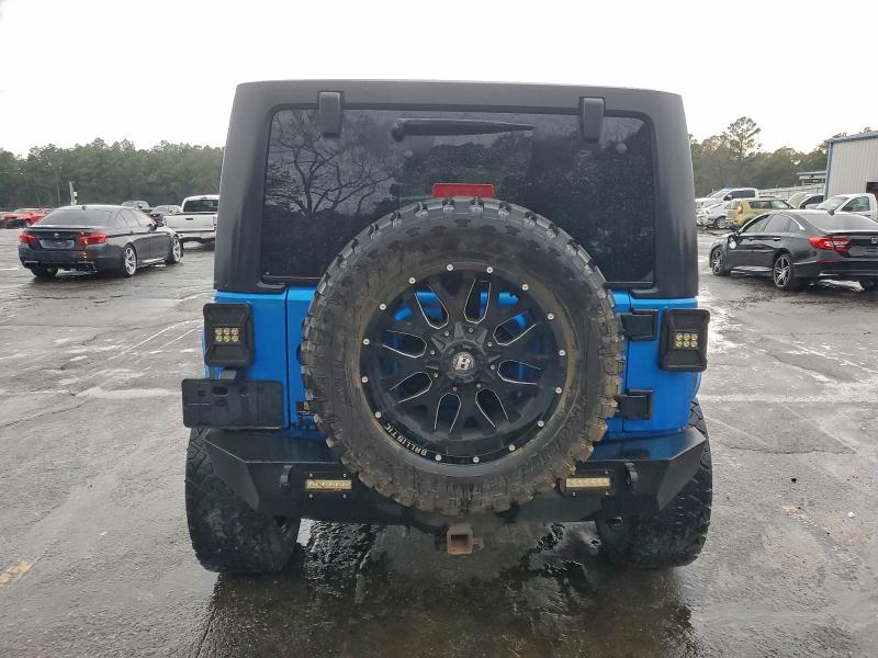 Photo 6 from auction – 2016 JEEP WRANGLER U with VIN 1C4BJWDG5GL131398