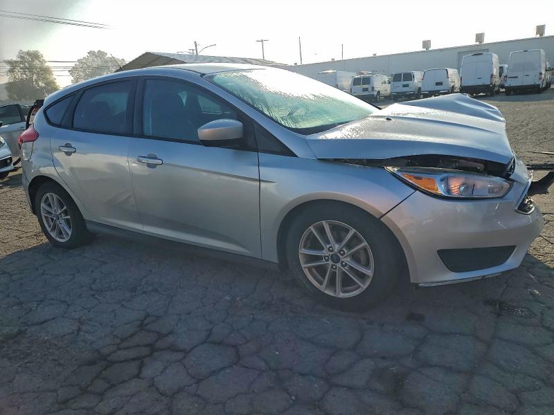 Photo 4 from auction – 2018 FORD FOCUS SE with VIN 1FADP3K27JL211411