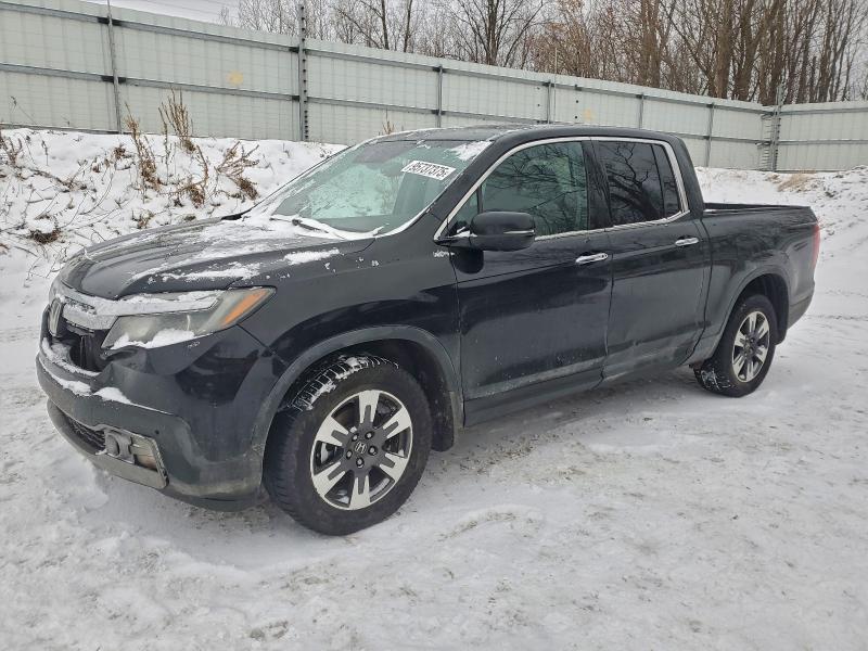 HONDA RIDGELINE 2017 with VIN 5FPYK3F71HB502040 - Photo from auction