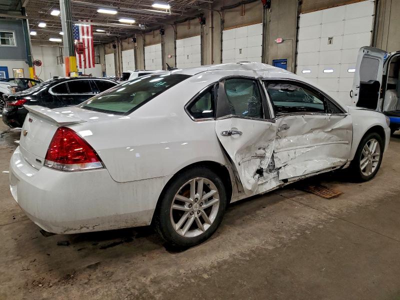 Photo 3 from auction – 2014 CHEVROLET IMPALA LIM with VIN 2G1WC5E3XE1152020