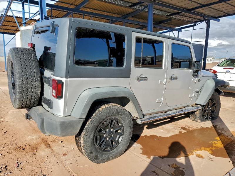Photo 3 from auction – 2012 JEEP WRANGLER U with VIN 1C4BJWDG8CL252503