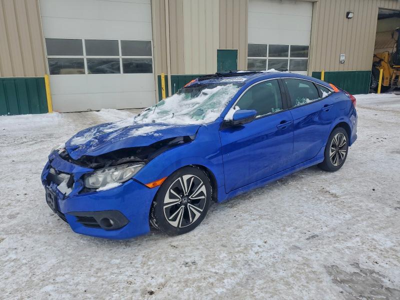 HONDA CIVIC EX 2018 with VIN 19XFC1E37JE002735 - Photo from auction