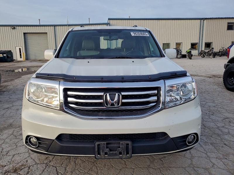 Photo 5 from auction – 2015 HONDA PILOT TOUR with VIN 5FNYF4H90FB040617