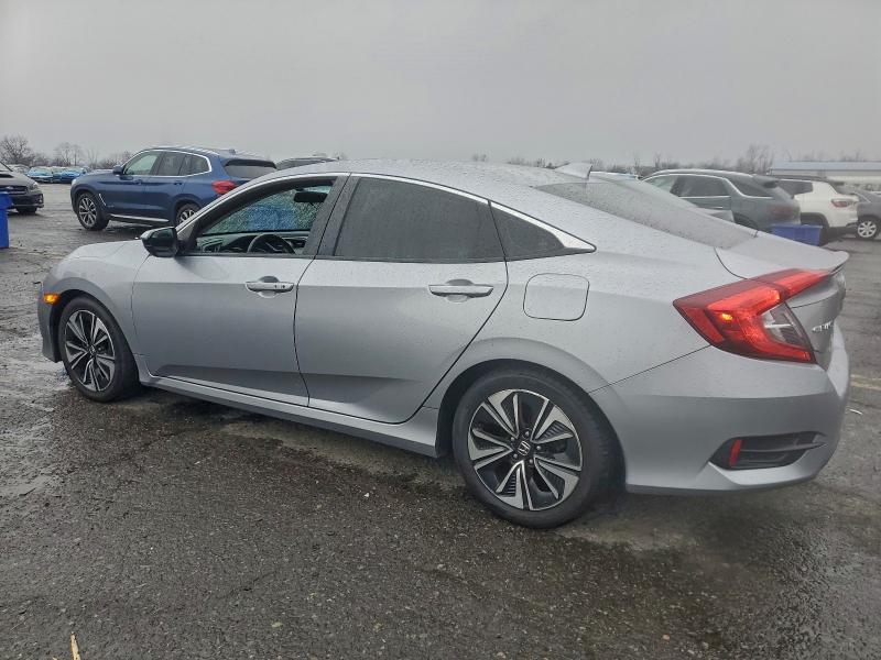 Photo 2 from auction – 2018 HONDA CIVIC EX with VIN 2HGFC1F32JH644400