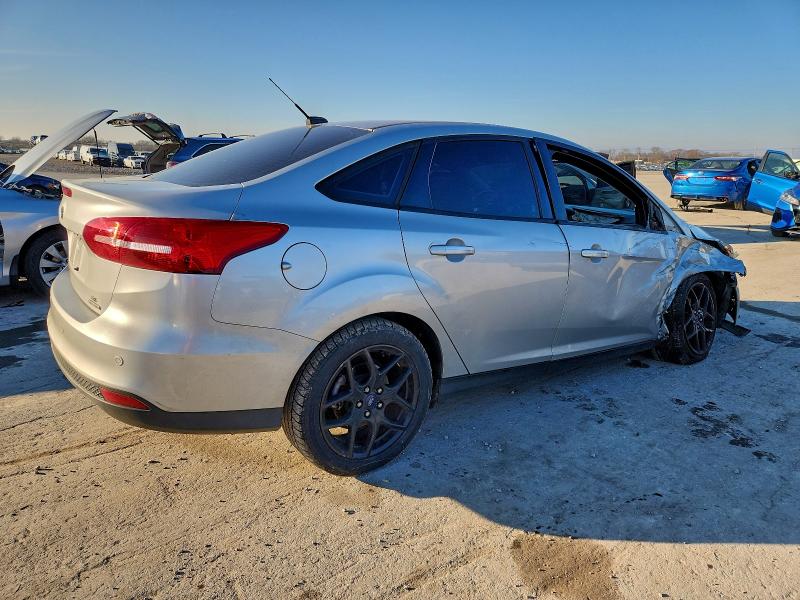 Photo 3 from auction – 2016 FORD FOCUS SE with VIN 1FADP3F22GL332334