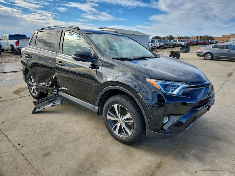 Photo 4 from auction – 2017 TOYOTA RAV4 XLE with VIN 2T3WFREVXHW341477