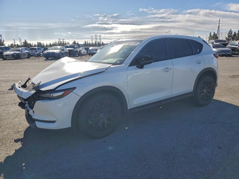 MAZDA CX-5 2020 with VIN JM3KFACM6L0772722 - Photo from auction