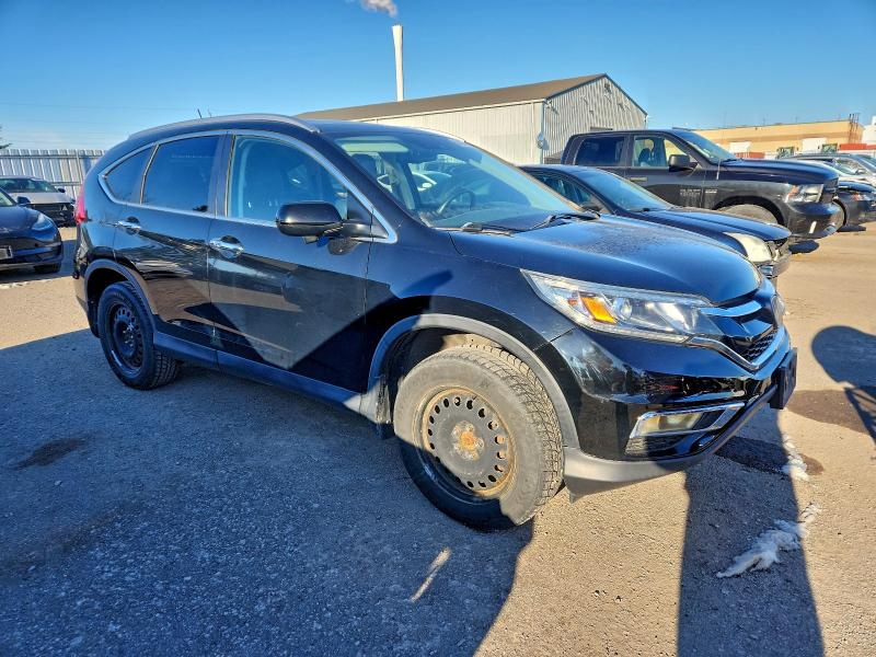 Photo 4 from auction – 2016 HONDA CR-V TOURI with VIN 5J6RM4H91GL808172