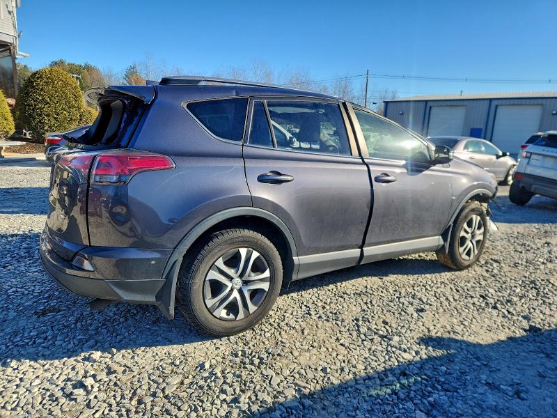 Photo 3 from auction – 2017 TOYOTA RAV4 LE with VIN JTMBFREV1HJ703256
