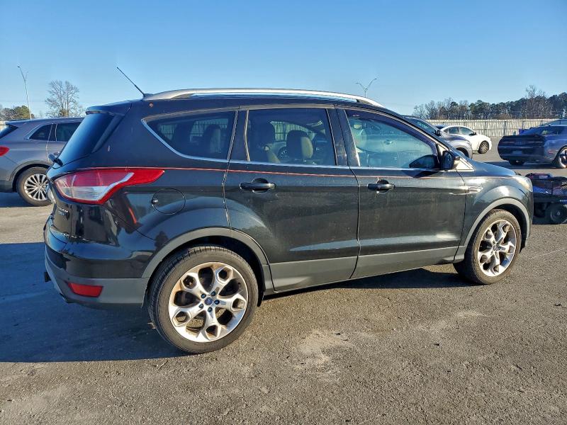 Photo 3 from auction – 2015 FORD ESCAPE TIT with VIN 1FMCU9J92FUA76299