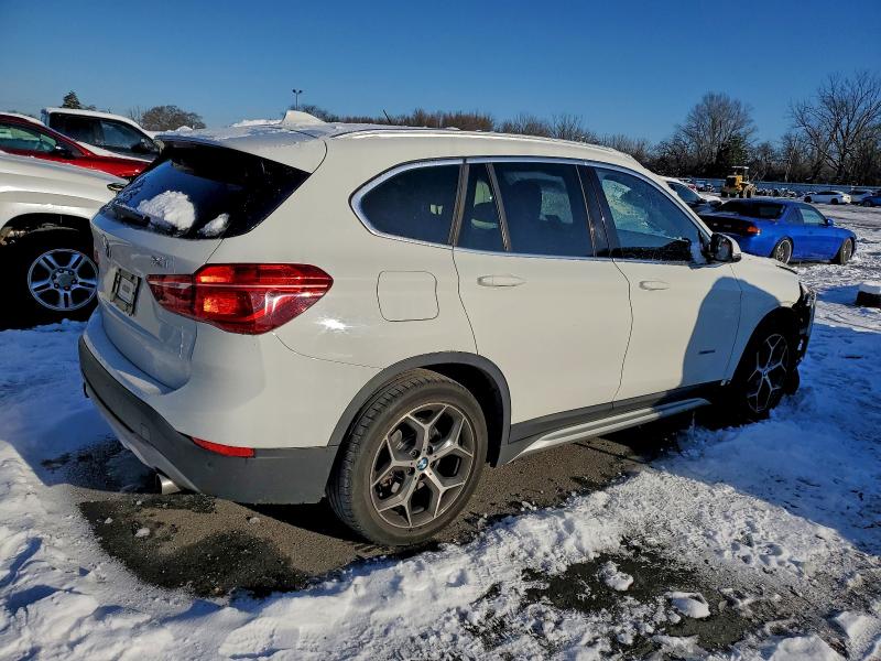 Photo 3 from auction – 2018 BMW X1 XDRIVE2 with VIN WBXHT3Z33J4A65935