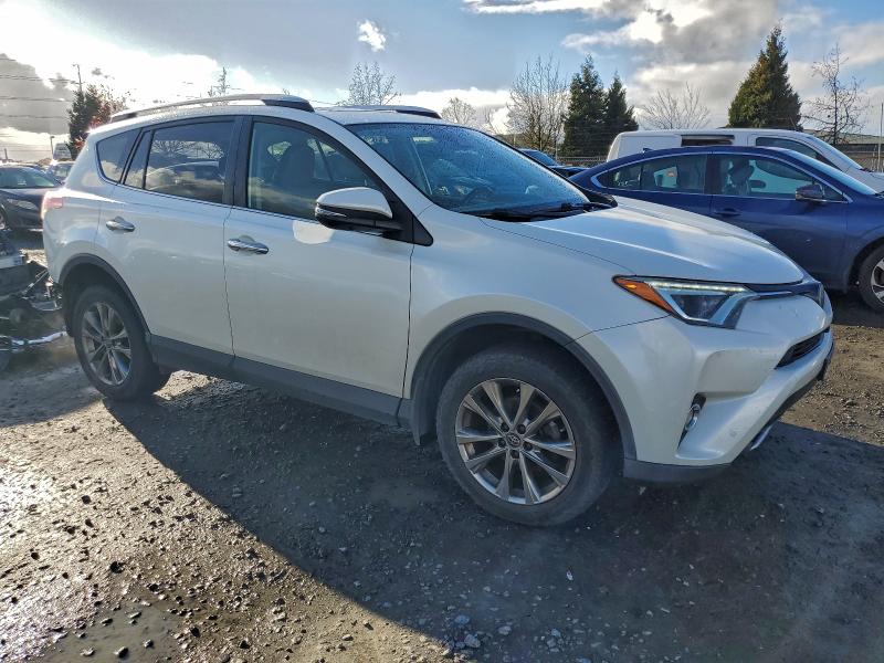 Photo 4 from auction – 2016 TOYOTA RAV4 LIMIT with VIN JTMDFREV1GD182464