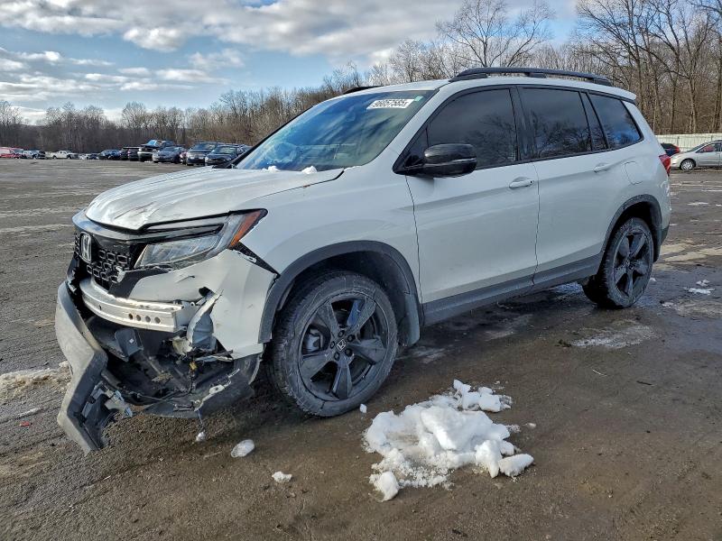 HONDA PASSPORT E 2021 with VIN 5FNYF8H04MB020389 - Photo from auction