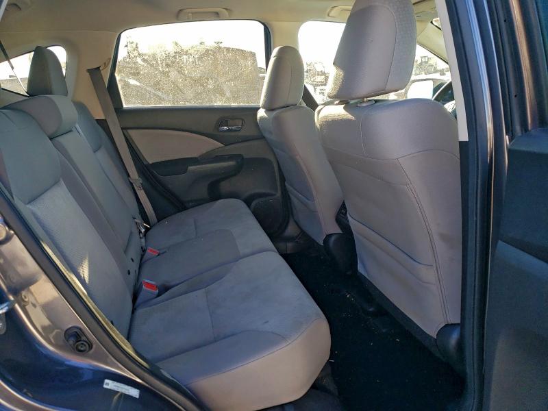 Photo 11 from auction – 2015 HONDA CR-V with VIN 2HKRM4H52FH619181