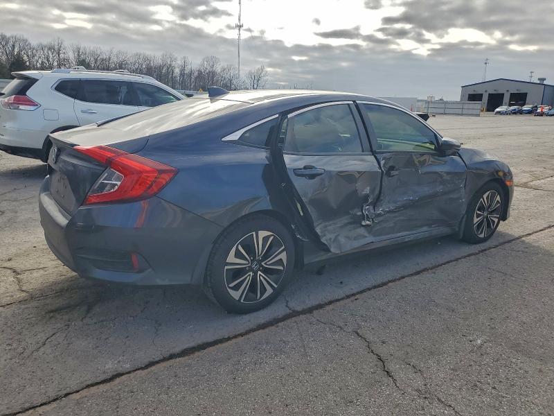 Photo 3 from auction – 2018 HONDA CIVIC with VIN JHMFC1F36JX042673