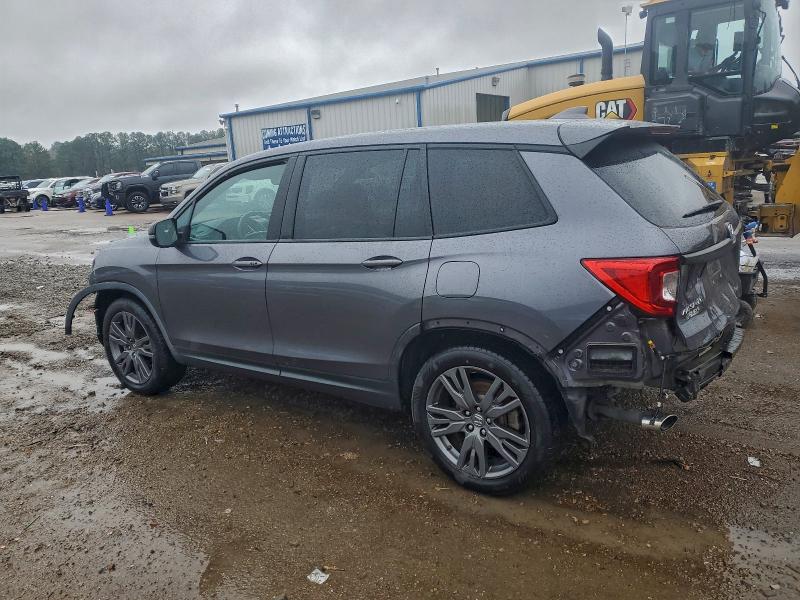 Photo 2 from auction – 2020 HONDA PASSPORT E with VIN 5FNYF7H52LB001473