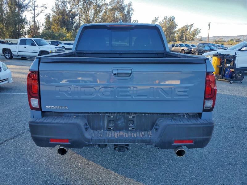 Photo 6 from auction – 2025 HONDA RIDGELINE with VIN 5FPYK3F58SB019540