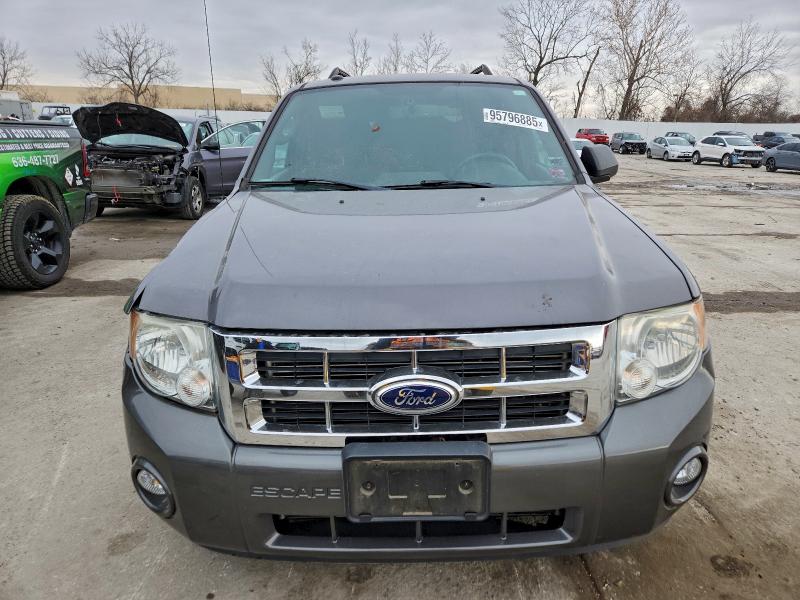 Photo 5 from auction – 2011 FORD ESCAPE XLT with VIN 1FMCU0D72BKB60134