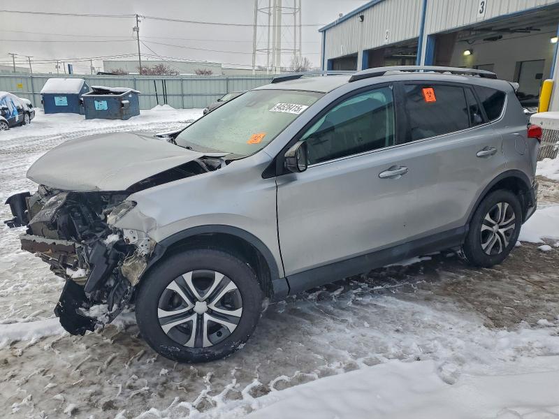 TOYOTA RAV4 LE 2018 with VIN 2T3BFREV6JW726524 - Photo from auction