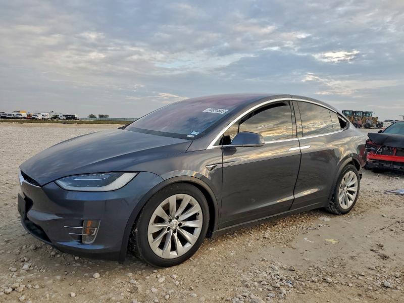 TESLA MODEL X 2018 with VIN 5YJXCAE23JF091211 - Photo from auction