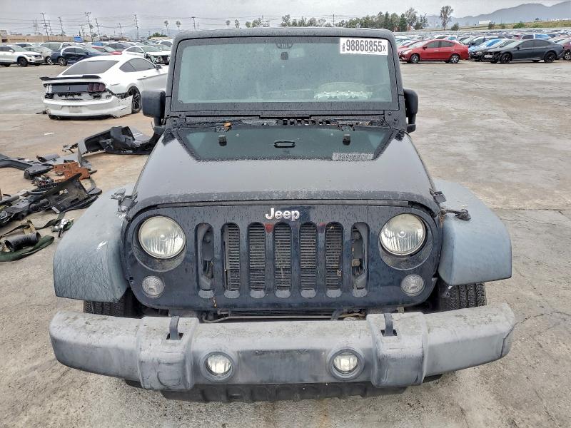 Photo 5 from auction – 2014 JEEP WRANGLER U with VIN 1C4BJWDG6EL104109
