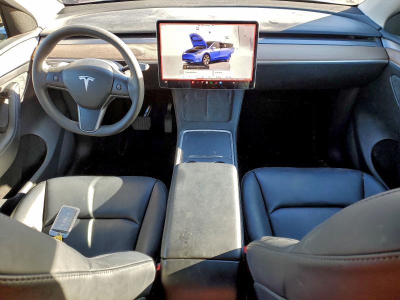 Photo 8 from auction – 2023 TESLA MODEL Y with VIN 7SAYGDEEXPF609556