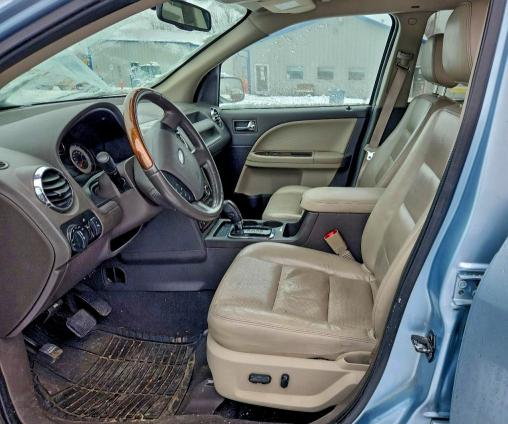 Photo 7 from auction – 2009 FORD TAURUS X L with VIN 1FMDK03W29GA04028