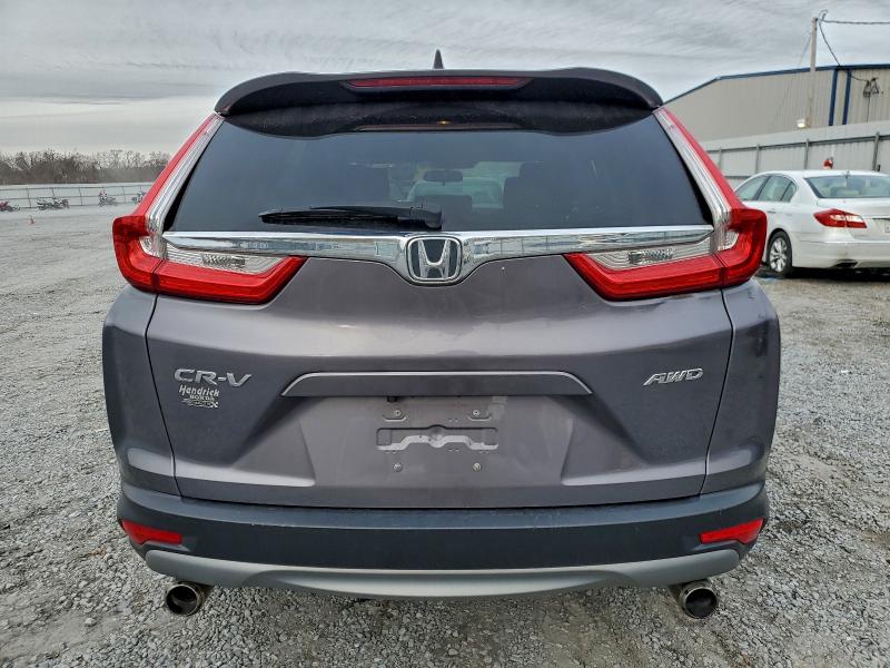 Photo 6 from auction – 2018 HONDA CR-V EX with VIN 7FARW2H58JE016438