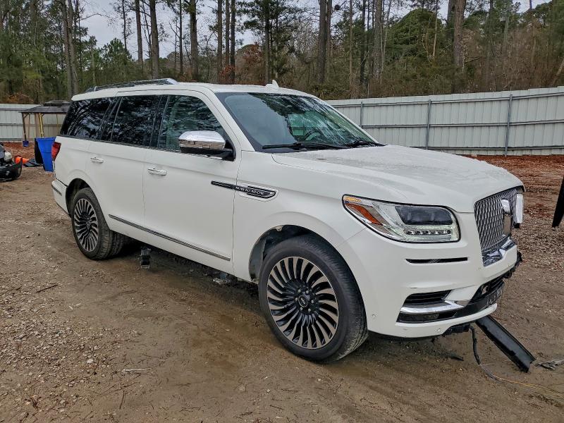 Photo 4 from auction – 2021 LINCOLN NAVIGATOR with VIN 5LMJJ2TT0MEL02697
