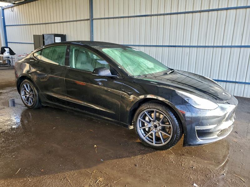 Photo 4 from auction – 2022 TESLA MODEL 3 with VIN 5YJ3E1EA5NF184835