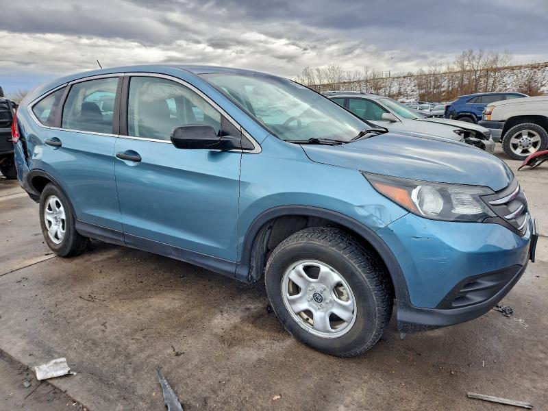 Photo 4 from auction – 2014 HONDA CR-V LX with VIN 2HKRM4H30EH673933
