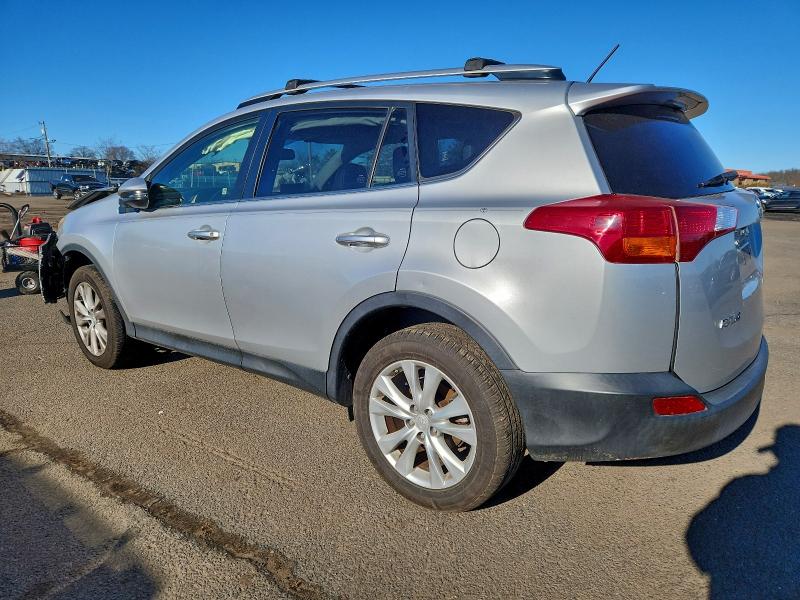 Photo 2 from auction – 2014 TOYOTA RAV4 with VIN JTMDFREV4ED095493