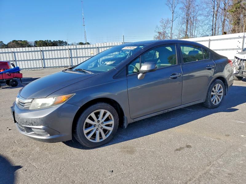HONDA CIVIC EXL 2012 with VIN 2HGFB2F9XCH547140 - Photo from auction
