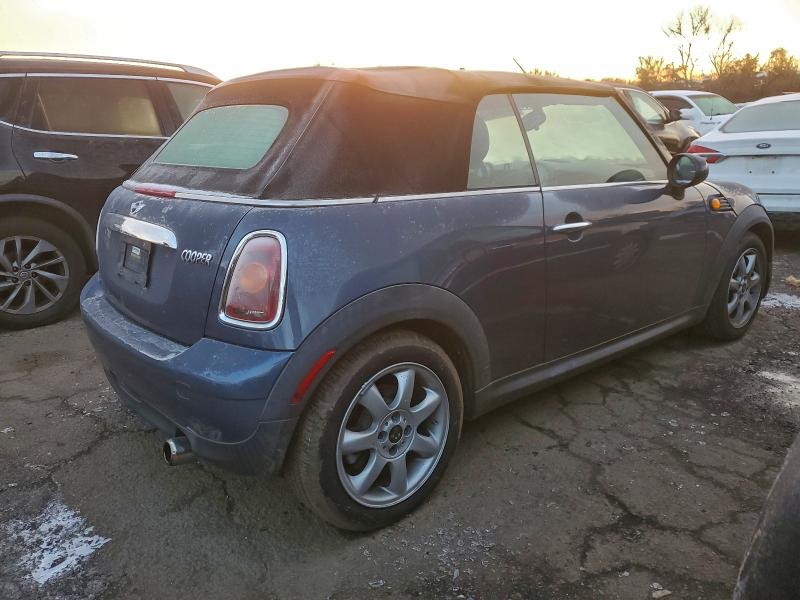 Photo 3 from auction – 2010 MINI COOPER with VIN WMWMR3C59ATU97143