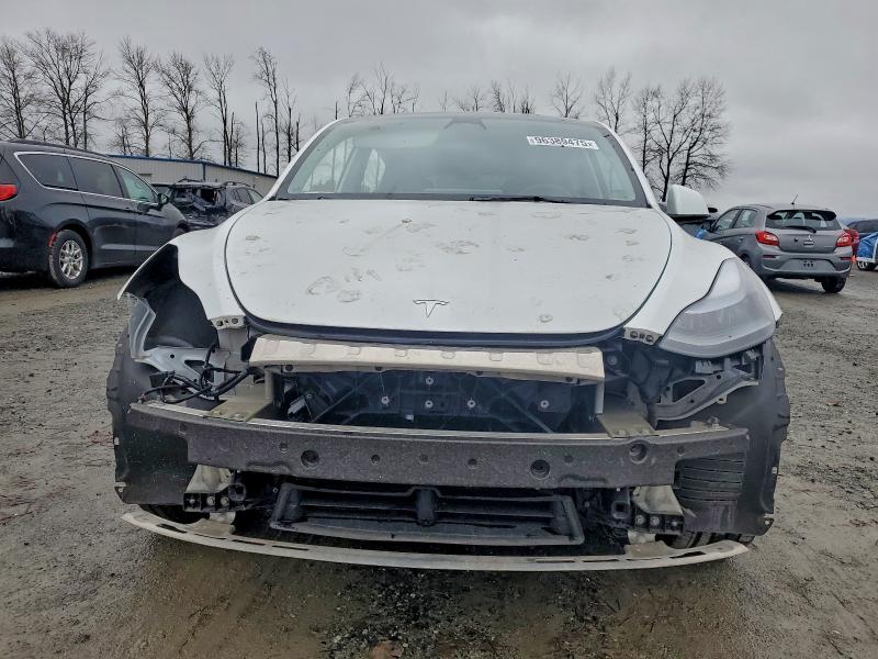 Photo 5 from auction – 2023 TESLA MODEL Y with VIN 7SAYGDEE8PF697779