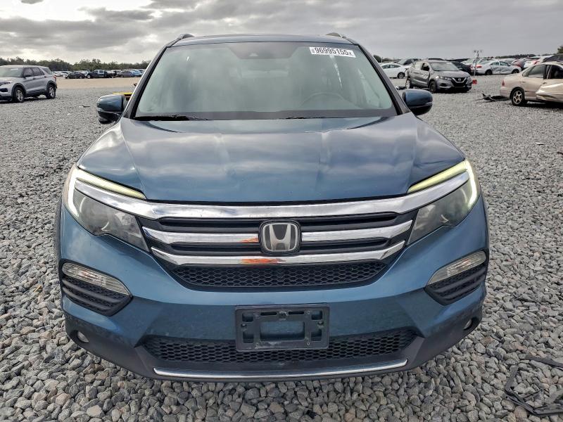 Photo 5 from auction – 2017 HONDA PILOT TOUR with VIN 5FNYF6H91HB028670