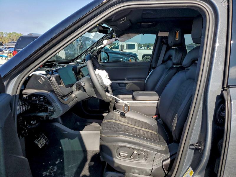 Photo 7 from auction – 2025 RIVIAN R1S with VIN 7PDSGBBA2SN048006