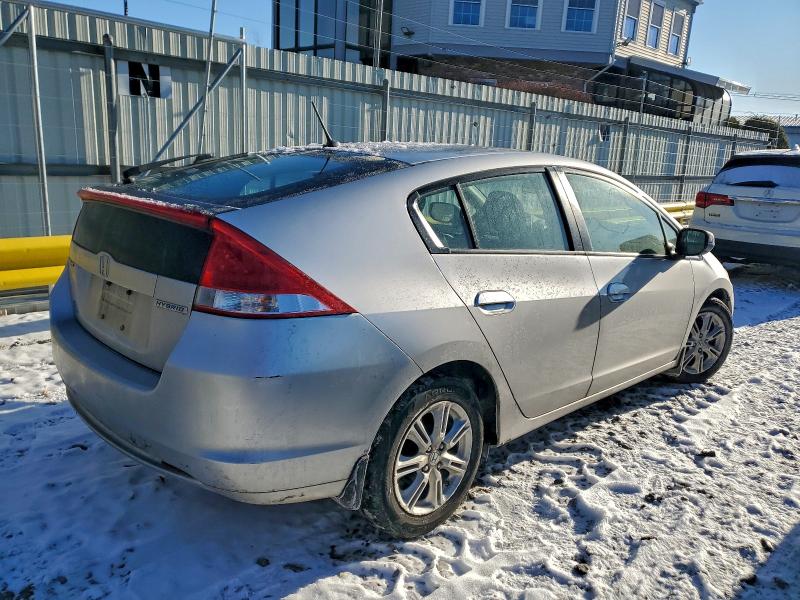 Photo 3 from auction – 2011 HONDA INSIGHT EX with VIN JHMZE2H74BS009909
