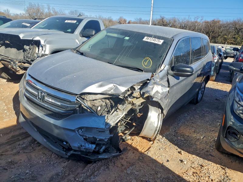 HONDA PILOT LX 2017 with VIN 5FNYF5H11HB011811 - Photo from auction